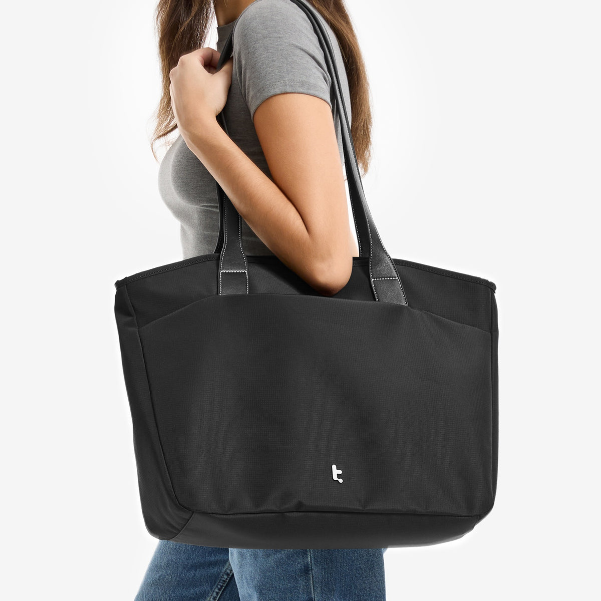 black travel tote bag with luggage sleeve Away Everywhere In Coast Blue Grab it and go using the top carry handles or adjustable shoulder strap July Everyday Large Tote Bag